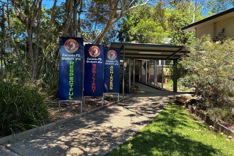 The entrance to our school with the PBL expectation signs leading up the walkway