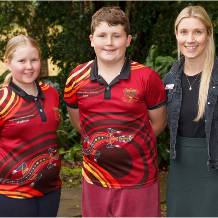 Our principal, Catie Crothers with two year 6 students.